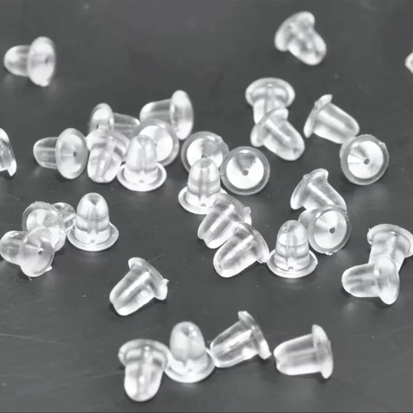 NIB PLASTIC EARRING BACKINGS - Picture 1 of 1